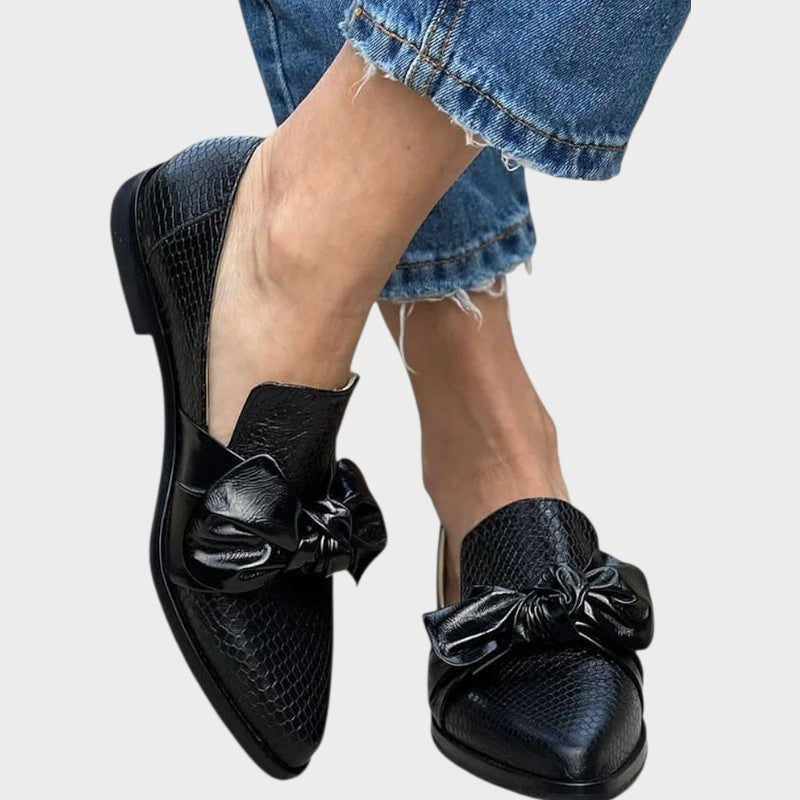 Zinnia – Black Loafers with Snake Skin Pattern and Bow Detail